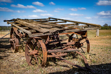 Fototapeta na wymiar Old farm wagon in the field, Chinchilla, Queensland, Australia