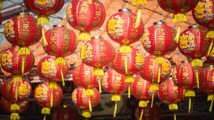 Fototapeta na wymiar Red Chinese Lanterns a word on lanterns is meant Happy new year will be successful. A traditional celebration such as the Chinese new year festival.