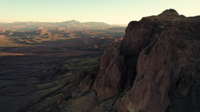 Dramatic Landscape Aerial in Arizona Desert with Sunrise on Superstition Mountains