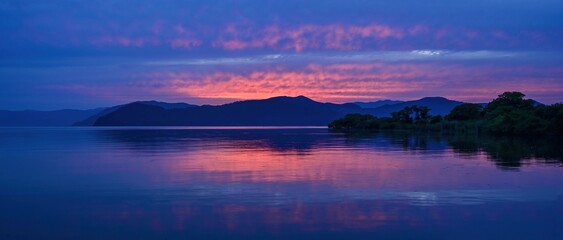 Fototapeta na wymiar 琵琶湖で見た幻想的な夕焼け情景＠滋賀