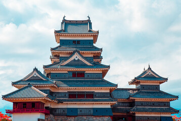 Obraz premium Straight on View of Matsumoto castle with blue skies in Japan