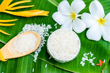 Thai jasmine rice and wooden spoon
