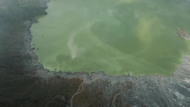Sulfuric Green Lake And Rugged Crater In El Chichonal Volcano In Chiapas, Mexico - aerial drone shot