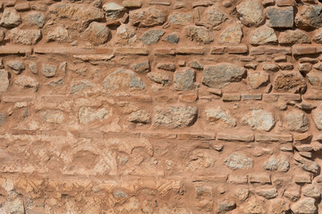 Textured wall of ruins in Delphi, Greece