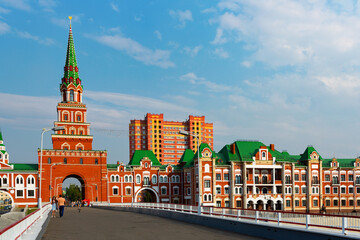 Fototapeta premium Brugge Embankment and Malaya Kokshaga River in Russian city Yoshkar-Ola in summertime.