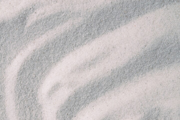 Abstract surface wallpaper of striped gray curve effect on the sand beach for background.