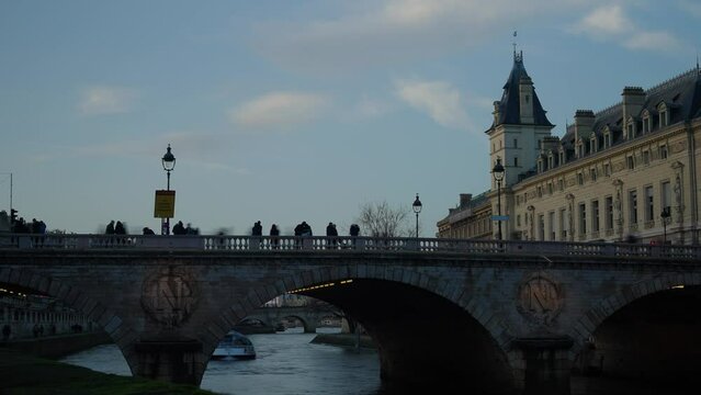 Tourists crossing Notre Dame bridge time lapse 4k 30p