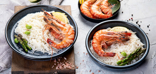 Shrimps with rice on light gray background.