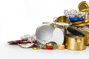 Pile of Separate collected metal garbage. Iron stuff for recycle on white background. Eco friendly concept. Recyclable metal waste: tin cans, foil, steel covers. Zero waste concept. Save the planet