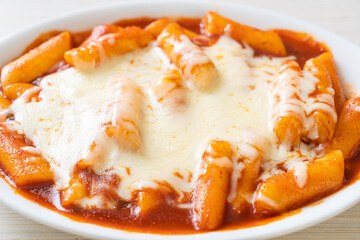 Korean rice cake in spicy Korean sauce with cheese, Cheese Tokpokki, Tteokbokki with Cheese