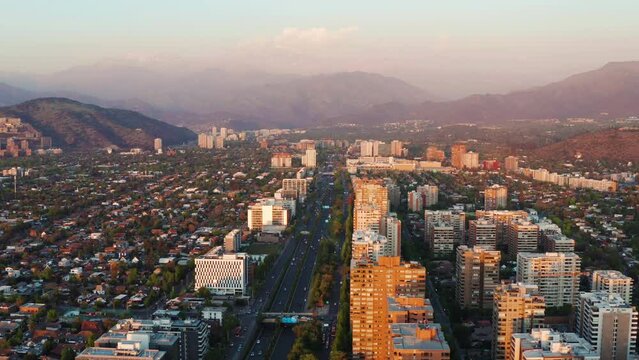 Aerial Sunset View Of Avenida Presidente Kennedy In Santiago. Circle Dolly