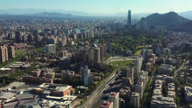 Aerial View Over Avenida Presidente Kennedy With Santiago City Views. Dolly Back Establishing Shot