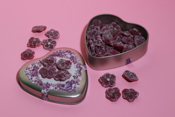 Heart shaped box of violet flavored sour candies