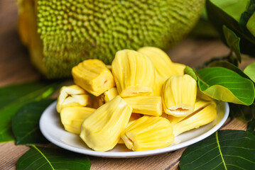 jackfruit on white plate with leaf, ripe jackfruit peeled tropical fruit fresh from jackfruit tree