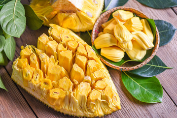 jackfruit on wooden basket with leaf, ripe jackfruit peeled tropical fruit fresh from jackfruit tree