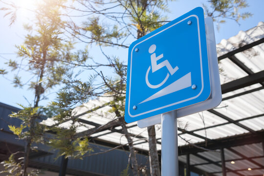 Wheelchair accessible entrance sign icon. Handicapped ramp signal, Way of wheelchair, concrete ramp