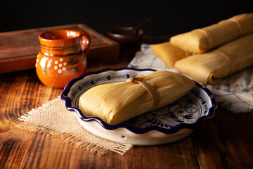 Tamales. Prehispanic dish typical of Mexico and some Latin American countries. Corn dough wrapped in corn leaves. The tamales are steamed.