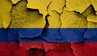 Flag of Colombia on old grunge wall in background 