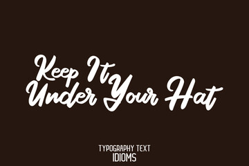 Keep It Under Your Hat. Hand Written Alphabetical Text idiom on Brown Background