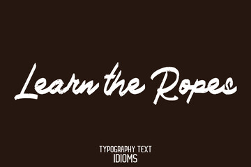 Learn the Ropes Hand Written Alphabetical Text idiom on Brown Background