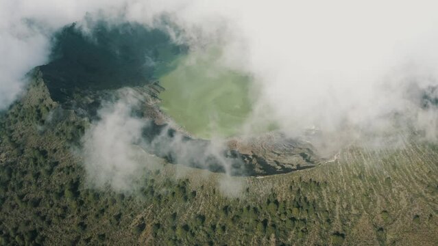 Clouds Over Crater Lake Of Chichonal, An Active Volcano In Chiapas, Mexico. aerial