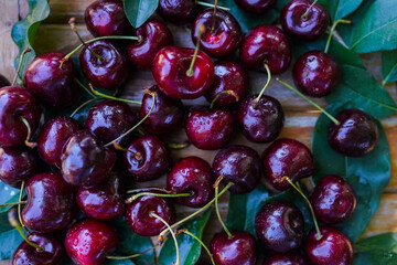 Berry Cherry on a wooden table rustic, top view.