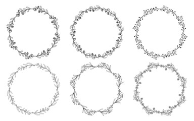 Fototapeta premium Set of hand drawn doodle round floral wreaths frames. Flower line and leaf circle frames design elements for wedding, mothers day, birthday, invitations.
