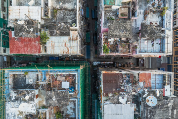 Amazing top view of messy rooftop of old residence building in Hong Kong