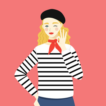 フレンチ風ファッションの女性上半身。ウインクをしてOKサインをする女性2