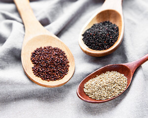 Red, black and white quinoa seeds