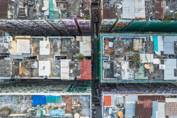 Amazing top view of messy rooftop of old residence building in Hong Kong