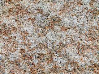 Rock surface of a breakwater. Background texture.
