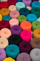 Close-up of multi-colored cotton skeins. Shop assortment for handmade