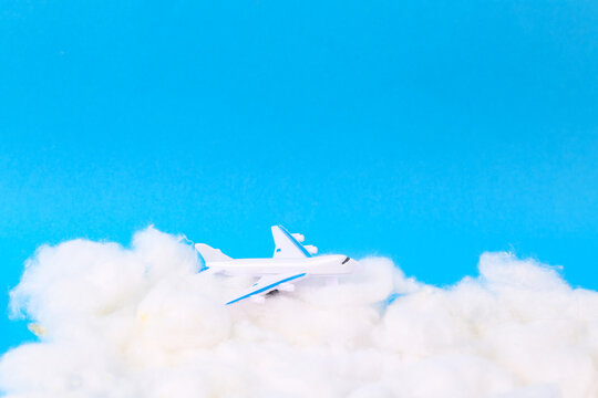 Passenger plane flying in the clouds. Studio shot