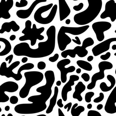 Seamless pattern of hand drawn abstract black spots.