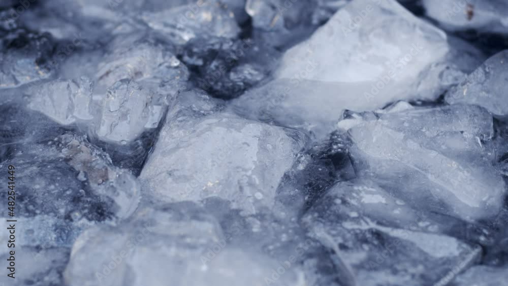 Poster cold ice water moving in a lake with ice chunks floating