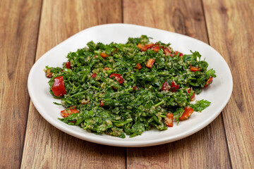 Raw ingredients cooking salad tabouli horizontal view. Healthy food