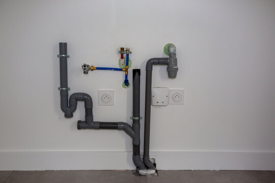 Water Inlet And Drain Pipe In A New House Inside Installation Of Plastic Domestic Water Pipes In New Apartment