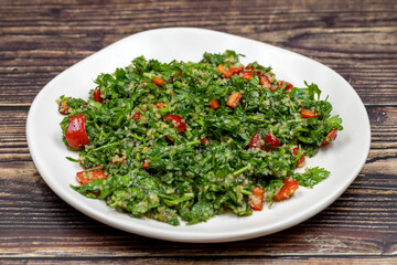 Raw ingredients cooking salad tabouli horizontal view. Healthy food