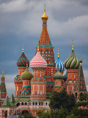 Fototapeta na wymiar travel to moscow, russia, main tourist attractions. Basil's Cathedral on Red Square in Moscow on a cloudy day