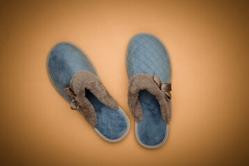 Women's sleeping slippers on yellow background. Top view