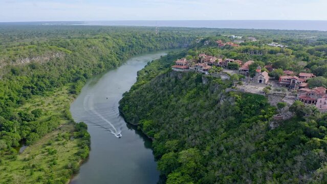 Altos de Chavon village overlooking river. Aerial circling