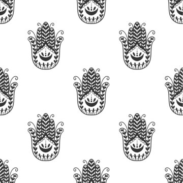 Mystic seamless pattern hamsa and evil eye symbol.Esoteric magic occult amulet.Abstract hand drawn style.
