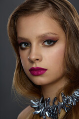 Fototapeta premium close-up portrait of a beautiful girl with Hollywood style lighting