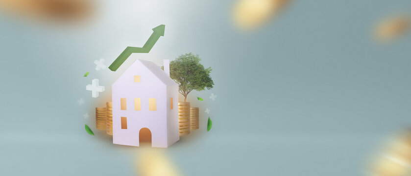 Real estate business investment and technology. Paper house with stack of bitcoin or gold coin and raising graph.Business investment and loans for real estate concept.