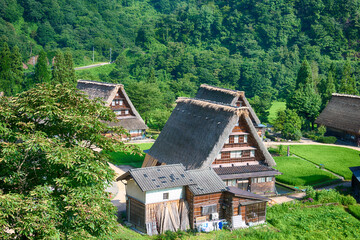 Fototapeta na wymiar Nanto, Japan - Jul 31 2017- Gassho-zukuri houses at Suganuma village, Gokayama area, Nanto City, Toyama Prefecture, Japan. UNESCO World Heritage Site - Historic Villages of Shirakawa-go and Gokayama.