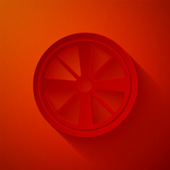Paper cut Alloy wheel for a car icon isolated on red background. Paper art style. Vector