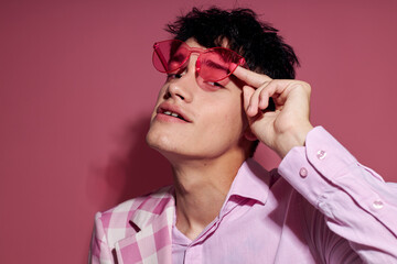 handsome guy self confidence pink plaid blazer fashion posing isolated background unaltered