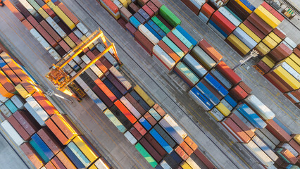 Aerial view of shipping container port terminal. Colourful pattern of containers in harbor. Maritime logistics global inport export trade transportation. © kasto