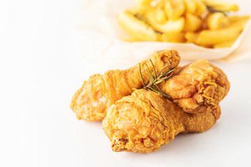 Fried crispy chicken legs isolated on white background.